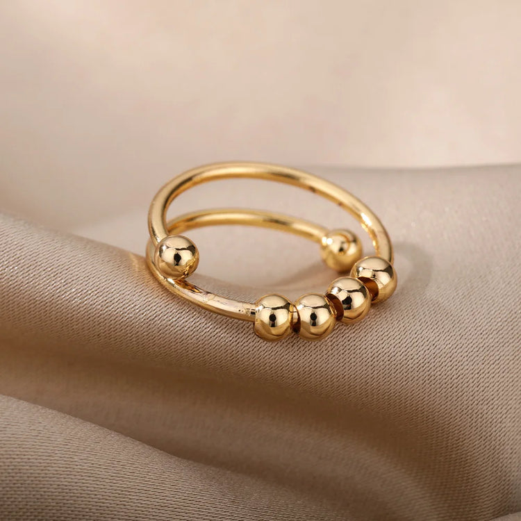 Adjustable stainless steel spinner ring with open band and rotating beads for women anti-stress jewelry