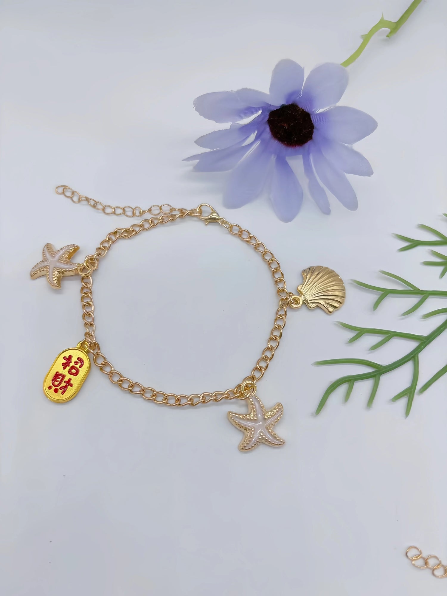 Silver 2-in-1 charm anklet bracelet with sparkly figure-8 chain, starfish and seashell accents
