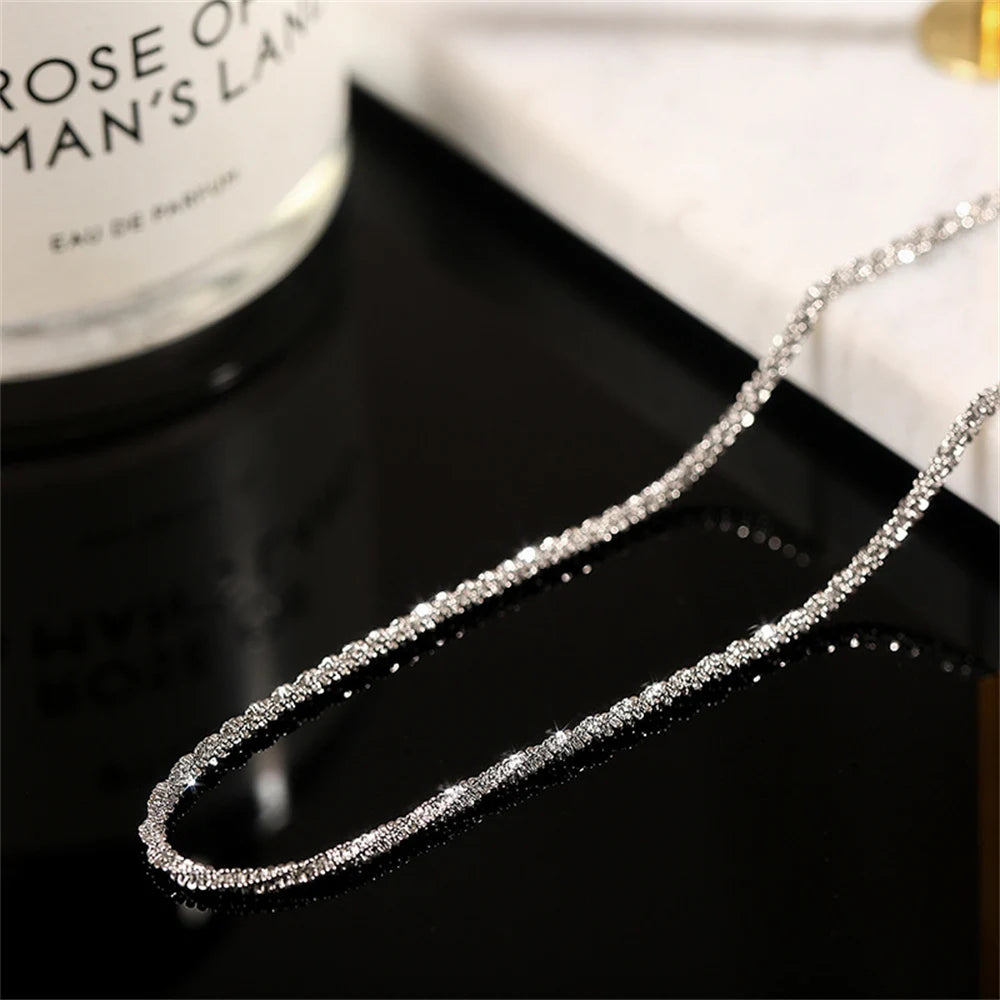 2-piece silver-plated copper anklet set for women with shiny simple chain design for beach and everyday wear