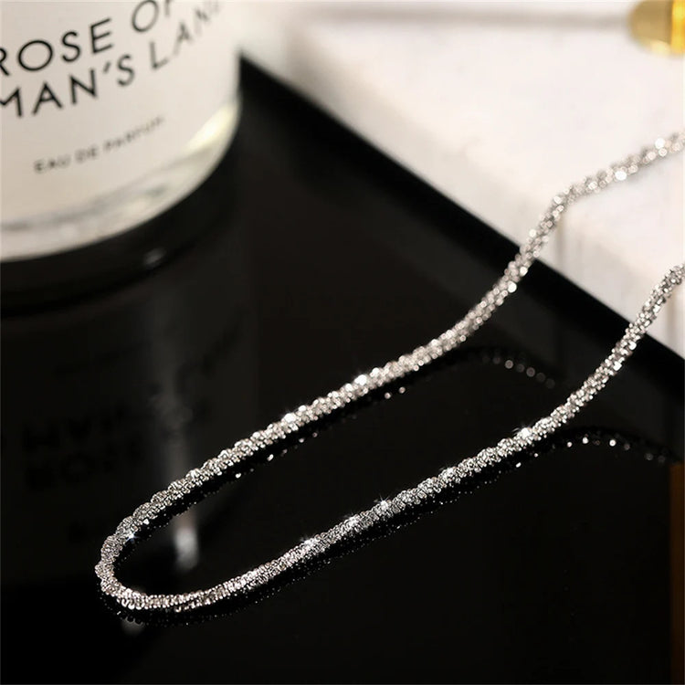 2-piece silver-plated copper anklet set for women with shiny simple chain design for beach and everyday wear