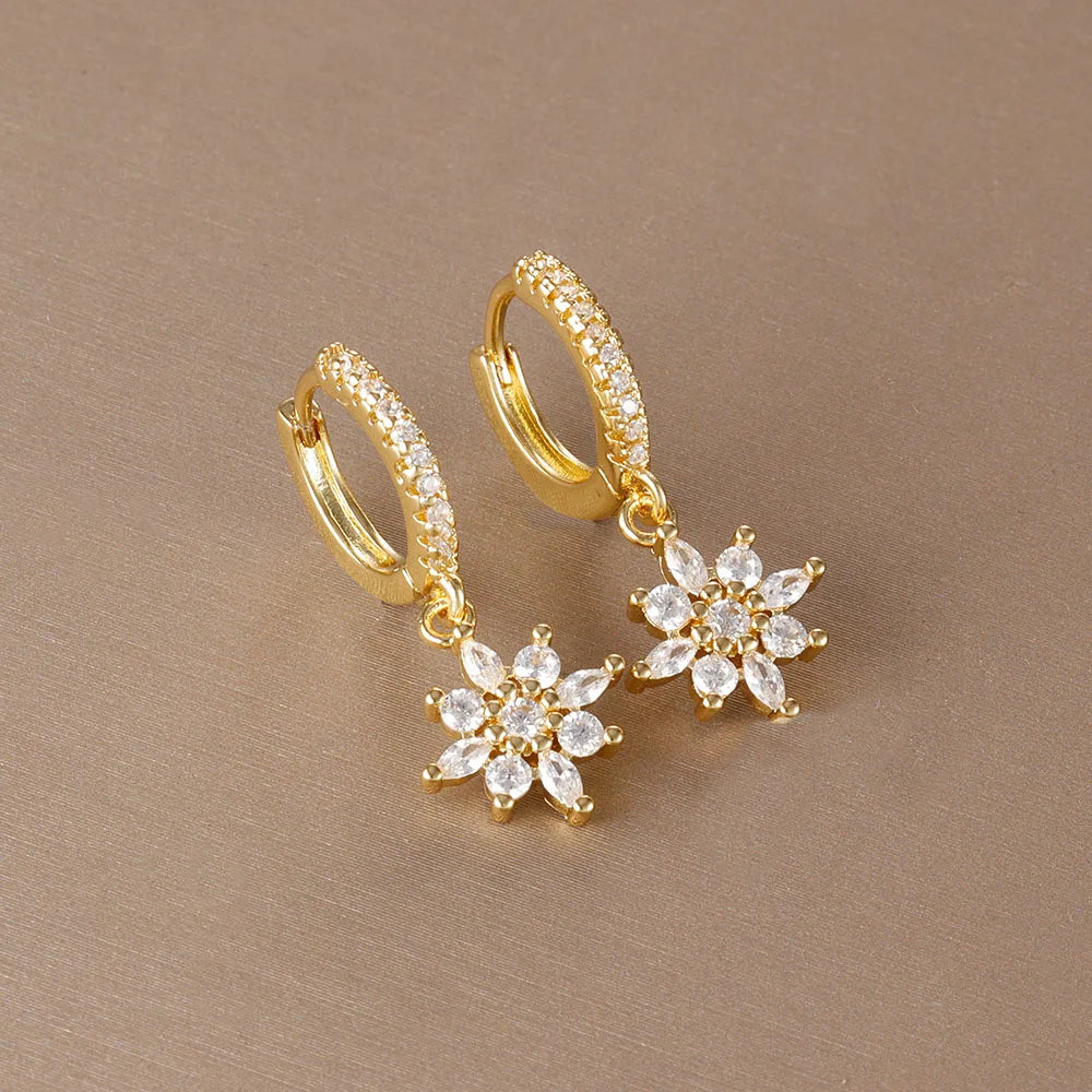 Luxury stainless steel star dangle earrings with 14K gold plating and sparkling cubic zirconia for women