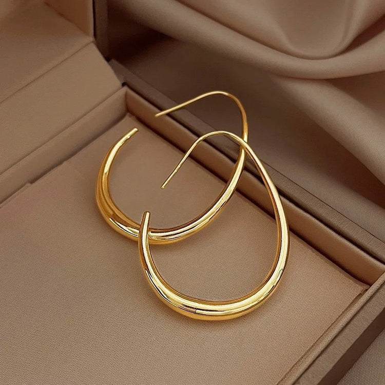 925 sterling silver gold-tone oval hoop earrings with elongated ellipse shape for women